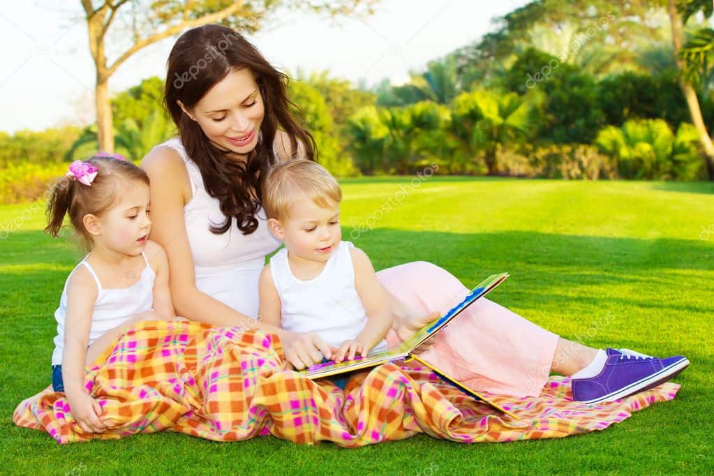 depositphotos  stock photo mother with children read book